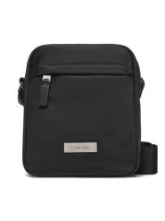Calvin Klein Saszetka Sleek Reporter LV04D3180G Czarny. Czarne saszetki męskie Calvin Klein, bez wzorów, z materiału. Za 299.99 zł.