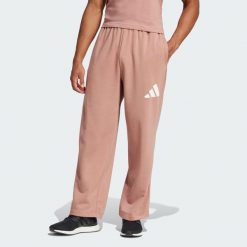 Spodnie Essentials Wide Leg 3 Bar Logo. Białe długie spodnie sportowe męskie ADIDAS, bez wzorów, z materiału, na fitness i siłownię. Za 229.00 zł.