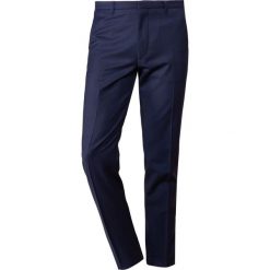 DRYKORN FOOT Spodnie garniturowe royal. Eleganckie spodnie męskie marki DRYKORN. Za 509.00 zł.