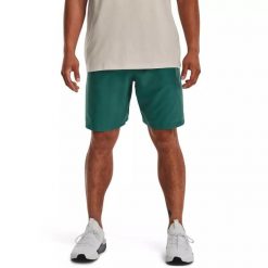 Spodenki do MMA męskie Under Armour Woven Graphic. Zielone szorty sportowe męskie Under Armour, bez wzorów, sportowe. Za 89.99 zł.