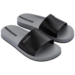 Klapki Ipanema Slide M 82832BC572 czarne. Czarne klapki i japonki męskie bez wzorów, z materiału. Za 218.61 zł.