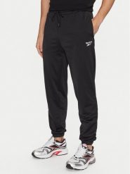 Reebok Spodnie dresowe Vector 100063237 Czarny Regular Fit. Czarne spodnie dresowe męskie Reebok, bez wzorów, z dresówki. Za 149.99 zł.