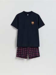 Dwuczęściowa piżama FC Barcelona - granatowy. Niebieskie piżamy męskie Reserved, l, bez wzorów, z bawełny, bez kołnierzyka, bez ramiączek. Za 149.99 zł.