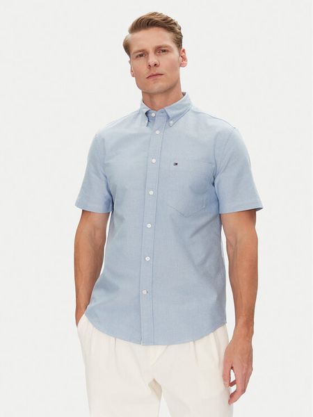 Tommy Hilfiger Koszula Heritage MW0MW36272 Błękitny Regular Fit. Niebieskie koszule męskie Tommy Hilfiger, m, bez wzorów, z bawełny, bez kołnierzyka, bez ramiączek. Za 189.99 zł.