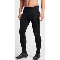 Nike Spodnie męskie M NK FLEX STRKE PANT KP czarno-fioletowy r. L (832902 015). Długie spodnie sportowe męskie Nike. Za 243.53 zł.