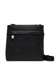 Calvin Klein Saszetka Emblem Emboss Slim Flatpack LV04D3370G Czarny. Czarne torby męskie na ramię Calvin Klein, bez wzorów, ze skóry. Za 369.99 zł.