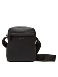 Calvin Klein Saszetka Ck Must Reporter LV04D3083G Czarny. Czarne saszetki męskie Calvin Klein, bez wzorów, ze skóry. Za 259.99 zł.