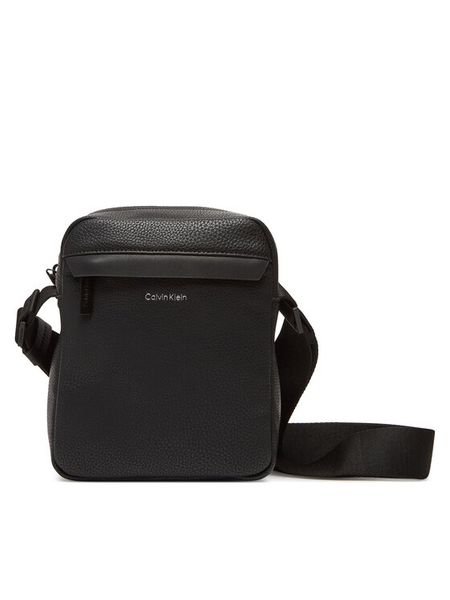 Calvin Klein Saszetka Ck Must Reporter LV04D3083G Czarny. Czarne saszetki męskie Calvin Klein, bez wzorów, ze skóry. Za 189.99 zł.