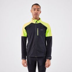 Kurtka do biegania męska Kiprun Run 900 Warm Regul. Czarne kurtki męskie KIPRUN, m, bez wzorów, z materiału, sportowe, bez ramiączek, bez kaptura. Za 299.99 zł.