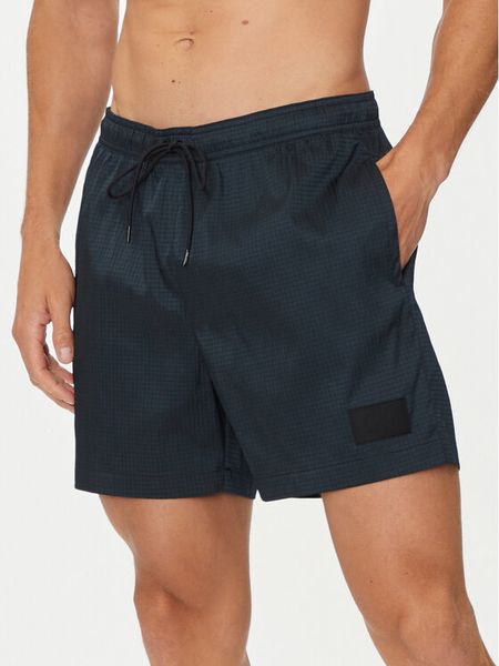Calvin Klein Swimwear Szorty kąpielowe KM0KM01023 Czarny Regular Fit. Czarne kąpielówki męskie Calvin Klein Swimwear, m, bez wzorów, z syntetyku. Za 179.99 zł.