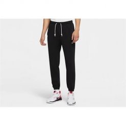 Spodnie sportowe męskie Nike Standard Issue. Brązowe długie spodnie sportowe męskie Nike, bez wzorów, z dresówki. Za 362.00 zł.