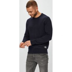 Calvin Klein Jeans - Sweter. Czarne swetry męskie Calvin Klein Jeans, z bawełny, z okrągłym kołnierzem, z krótkim rękawem. Za 399.90 zł.
