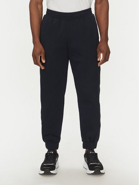 EA7 Emporio Armani Spodnie dresowe 7M000545 AF12660 UB102 Granatowy Modern Fit. Niebieskie spodnie dresowe męskie EA7 Emporio Armani, bez wzorów, z dresówki. Za 279.99 zł.
