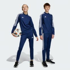 Tiro 23 Club Training Pants. Białe spodnie dresowe męskie ADIDAS, bez wzorów, z dresówki. Za 110.99 zł.