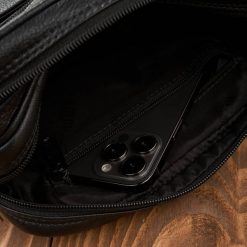 Paolo Peruzzi Saszetka męska do ręki skórzana dwukomorowa czarna T-131-BL. Czarne saszetki męskie Paolo Peruzzi, bez wzorów. Za 186.65 zł.