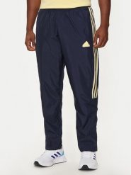 Adidas Spodnie dresowe House of Tiro IW3582 Granatowy Regular Fit. Niebieskie spodnie dresowe męskie ADIDAS, bez wzorów, z dresówki. Za 219.99 zł.