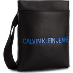 Saszetka CALVIN KLEIN JEANS - Smooth Flat Pack K40K400373 001. Saszetki męskie marki Calvin Klein Jeans. W wyprzedaży za 269.00 zł.