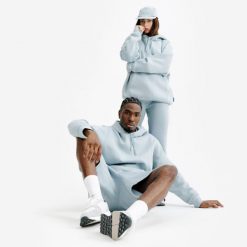 Bluza z kapturem unisex Elementals. Niebieskie bluzy nierozpinane męskie Decathlon, s, bez wzorów, z bawełny, sportowe, bez ramiączek, z kapturem. Za 169.99 zł.
