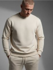 Bluza crewneck basic - kremowy. Białe bluzy nierozpinane męskie Sinsay, l, bez wzorów, bez ramiączek, bez kaptura. Za 29.99 zł.