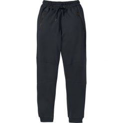 Spodnie dresowe Slim Fit bonprix czarny. Spodnie dresowe męskie marki bonprix. Za 84.99 zł.