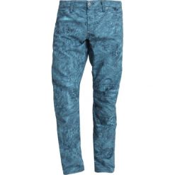 GStar PHARRELL WILLIAMS ELWOOD Spodnie materiałowe indigo/lake. Spodnie na co dzień męskie marki G-Star. Za 559.00 zł.