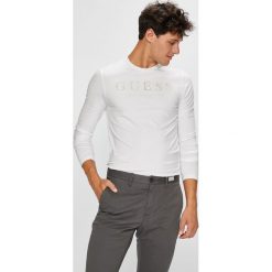Guess Jeans - Longsleeve. Szare koszulki męskie z długim rękawem Guess Jeans, z aplikacjami, z bawełny, z okrągłym kołnierzem, z długim rękawem. Za 159.90 zł.