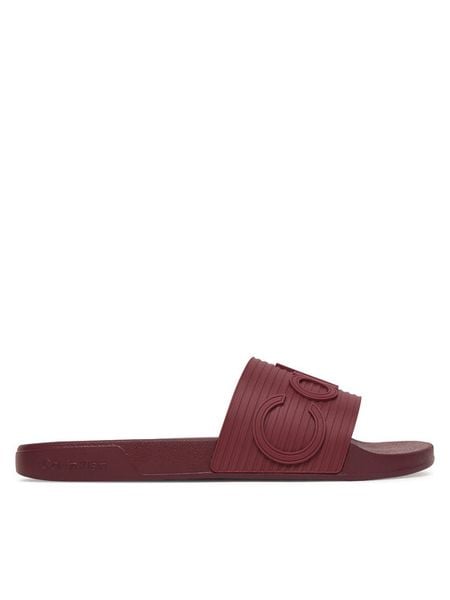 Calvin Klein Klapki Nemo - Contoured Emblem Logo Sliders HM0HM02113 Bordowy. Czerwone klapki i japonki męskie Calvin Klein, bez wzorów, z syntetyku. Za 229.99 zł.