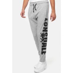 Spodnie dresowe klasyczne Lonsdale Portessie. Czarne spodnie dresowe męskie Lonsdale, bez wzorów, z dresówki. Za 255.00 zł.