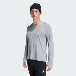 Koszulka adi365 Running Essentials Longsleeve. Szare buty do biegania męskie ADIDAS, bez wzorów, bez zapięcia, do biegania, climacool (adidas). Za 149.00 zł.