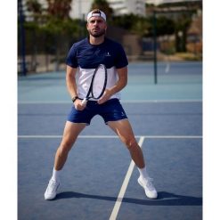 Koszulka sportowa męska Performance. Białe t-shirty sportowe męskie NORDICDOTS, l, bez wzorów, z elastanu, sportowe, bez ramiączek. Za 230.00 zł.