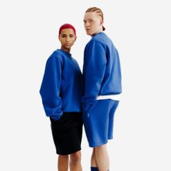 Bluza okrągły dekolt unisex Elementals. Niebieskie bluzy nierozpinane męskie Decathlon, l, bez wzorów, z bawełny, bez ramiączek, bez kaptura. Za 149.99 zł.