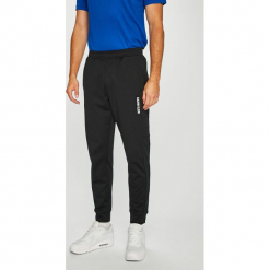 Calvin Klein Performance - Spodnie. Szare długie spodnie sportowe męskie marki Calvin Klein Performance, z bawełny. Za 399.90 zł.