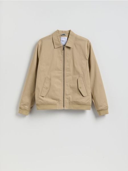 Kurtka bomberka z kołnierzem - beżowy. Brązowe kurtki męskie Reserved, l, bez wzorów, z bawełny, bez ramiączek, bez kaptura. Za 159.99 zł.