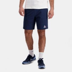 Szorty Le Coq Sportif Essentiels. Niebieskie szorty sportowe męskie le coq sportif, bez wzorów, sportowe. W wyprzedaży za 195.00 zł.