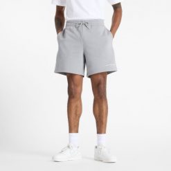 Spodenki męskie New Balance MS51506YST – szare. Szare szorty sportowe męskie New Balance, bez wzorów, z bawełny, klasyczne. Za 139.99 zł.