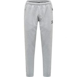 Spodnie sportowe do joggingu Hummel Move Grid. Szare szorty sportowe męskie HUMMEL, bez wzorów, z dresówki, sportowe. Za 233.50 zł.
