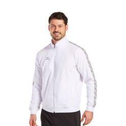 Kurtka dresowa Erima Essential Team. Niebieskie kurtki męskie Erima, s, bez wzorów, z dresówki, retro, bez ramiączek, bez kaptura. Za 258.50 zł.