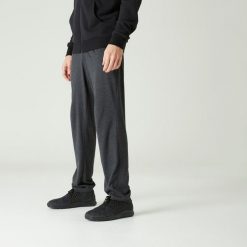 Spodnie dresowe męskie Domyos Gym & Pilates 100. Szare spodnie dresowe męskie DOMYOS, bez wzorów, z bawełny. Za 49.99 zł.
