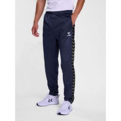 Spodnie dresowe polyesterowe Hummel Authentic. Niebieskie spodnie dresowe męskie HUMMEL, bez wzorów, z dresówki. Za 193.50 zł.