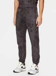 Guess Spodnie dresowe Z5RB14 K9YI1 Szary Regular Fit. Szare spodnie dresowe męskie Guess, z aplikacjami, z bawełny. Za 299.99 zł.