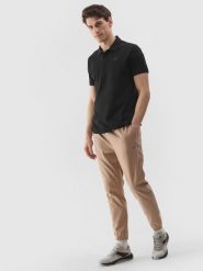 4F Spodnie casual joggery męskie - beżowe M. Brązowe spodnie dresowe męskie 4f, bez wzorów, z bawełny. W wyprzedaży za 89.99 zł.