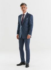 PAKO LORENTE – Granatowe spodnie garniturowe w pepitkę. Niebieskie eleganckie spodnie męskie Pako Lorente, bez wzorów, z elastanu. Za 399.99 zł.