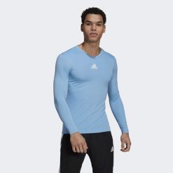 Koszulka piłkarska męska adidas Team Base Tee. Niebieskie bielizna termoaktywna męska ADIDAS, m, bez wzorów, bez ramiączek, do piłki nożnej. Za 69.00 zł.