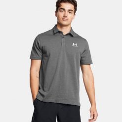 Koszulka polo męska Under Armour UA Icon. Szare koszulki polo męskie Under Armour, m, bez wzorów, sportowe, bez kołnierzyka, bez ramiączek. Za 199.99 zł.