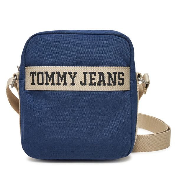 Saszetka Tommy Jeans. Niebieskie saszetki męskie Tommy Jeans, bez wzorów, z jeansu, małe. Za 169.99 zł.