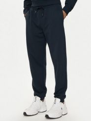 Armani Exchange Spodnie dresowe 6DZPJM ZJADZ 1510 Granatowy Regular Fit. Niebieskie spodnie dresowe męskie Armani Exchange, bez wzorów, z bawełny. Za 289.99 zł.