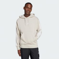 Bluza z kapturem Essentials 3-Stripes French Terry. Białe bluzy nierozpinane męskie ADIDAS, xl, bez wzorów, z materiału, sportowe, bez ramiączek, z kapturem. Za 222.00 zł.