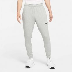 Spodnie sportowe męskie Nike Drifit Trapered. Czarne długie spodnie sportowe męskie Nike, bez wzorów, z dresówki, na fitness i siłownię. Za 358.00 zł.