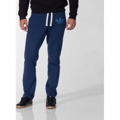 Adidas Spodnie męskie Slim Sweatpants granatowy r. XS (M69898). Długie spodnie sportowe męskie ADIDAS. Za 132.78 zł.