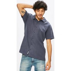 Tommy Jeans - Koszula. Szare koszule męskie Tommy Jeans, z bawełny, z klasycznym kołnierzykiem, z krótkim rękawem. Za 269.90 zł.